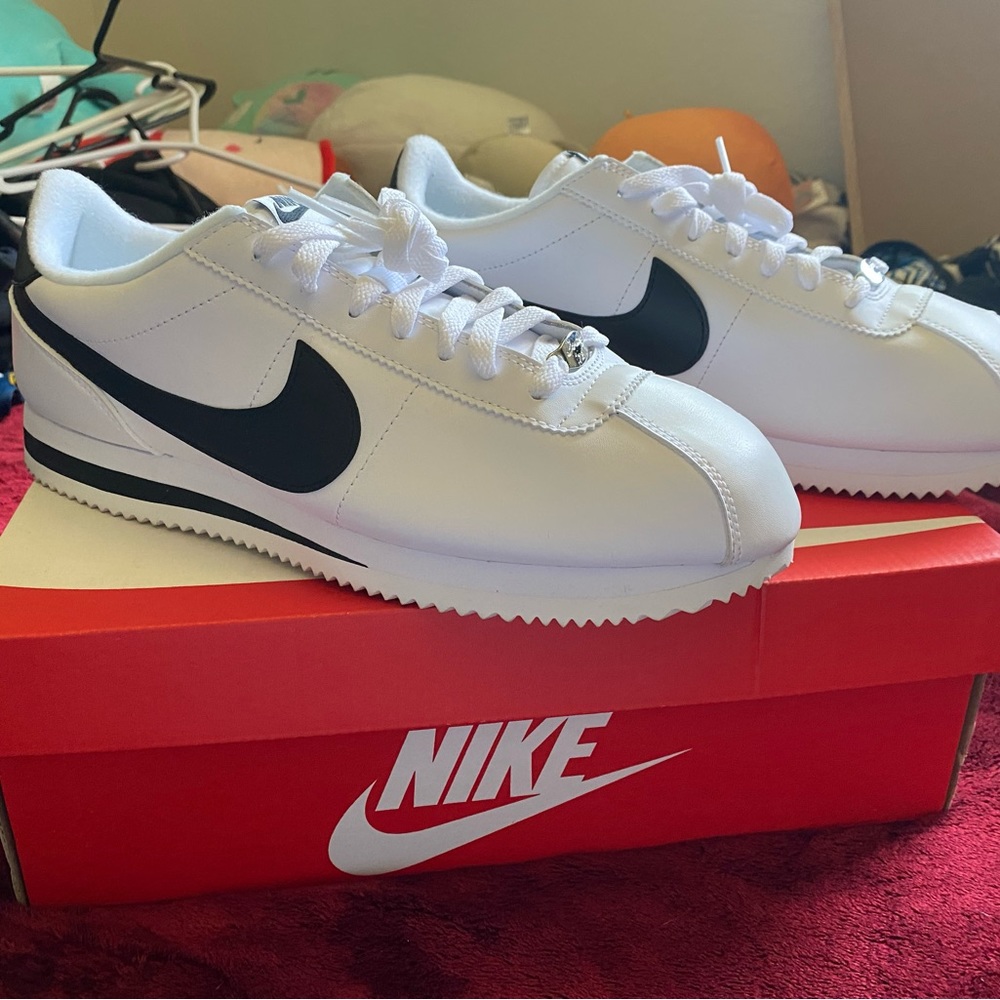 Black and white nike cortes